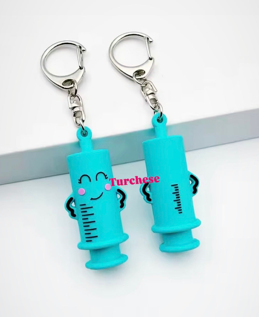 Rompi fialetta SILICONE turchese ( portachiavi )